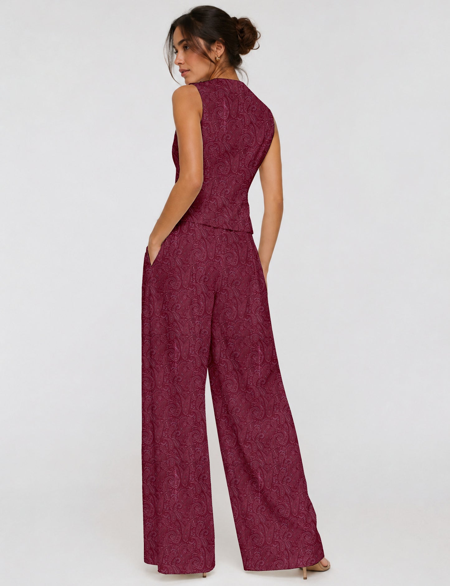 Women's tailored waistcoat set with a sleeveless V-neck button-front waistcoat and high-rise wide leg trousers in a coordinated matching outfit.