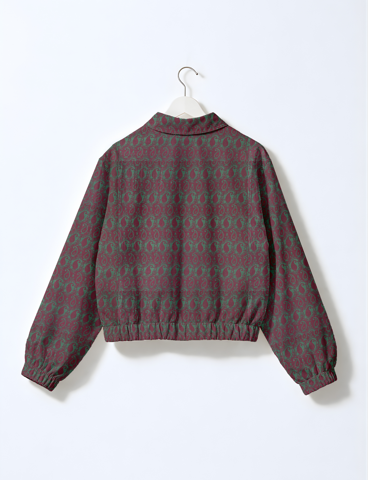 Upcycled Bomber Jacket made from recycled sari materials, featuring a cute cropped shape, elasticated hem and cuffs, and contrast sari print lining. Sustainable apparel promoting eco-friendly fashion and ethical clothing.