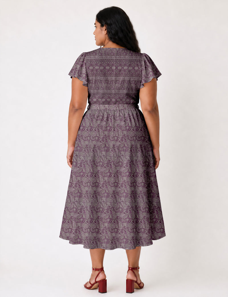 Elegant midi wrap dress with a V-neckline, adjustable waist tie, fitted bodice, and flared skirt for a timeless, flattering silhouette.