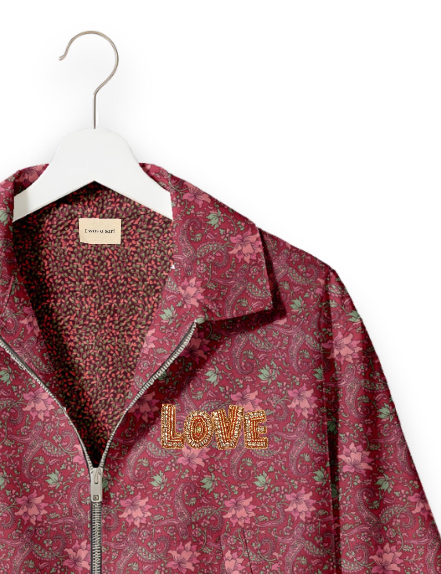 Love Bomber Jacket made from recycled fabric, featuring hand-stitched Aari embroidery. A unique piece of zero-waste clothing, part of the circular fashion movement. Designed with upcycled materials for a stylish yet environmentally friendly clothing choice.