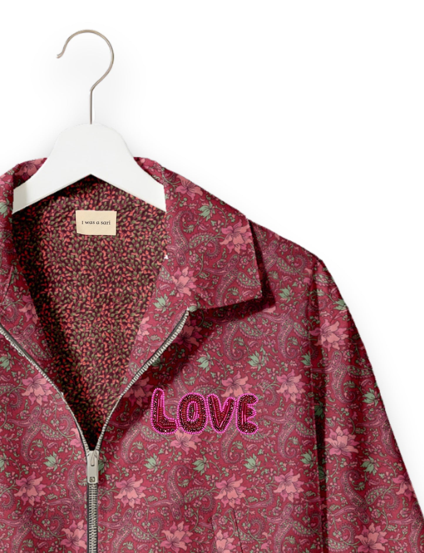 Love Bomber Jacket made from recycled fabric, featuring hand-stitched Aari embroidery. A unique piece of zero-waste clothing, part of the circular fashion movement. Designed with upcycled materials for a stylish yet environmentally friendly clothing choice.