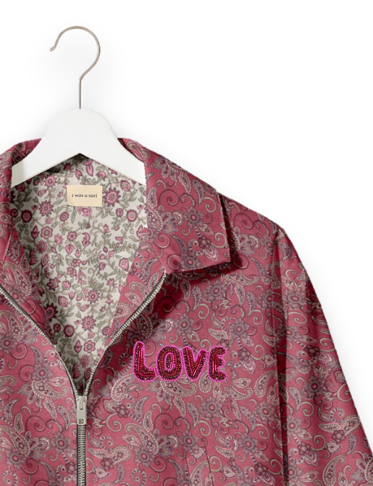 Love Bomber Jacket made from recycled fabric, featuring hand-stitched Aari embroidery. A unique piece of zero-waste clothing, part of the circular fashion movement. Designed with upcycled materials for a stylish yet environmentally friendly clothing choice.