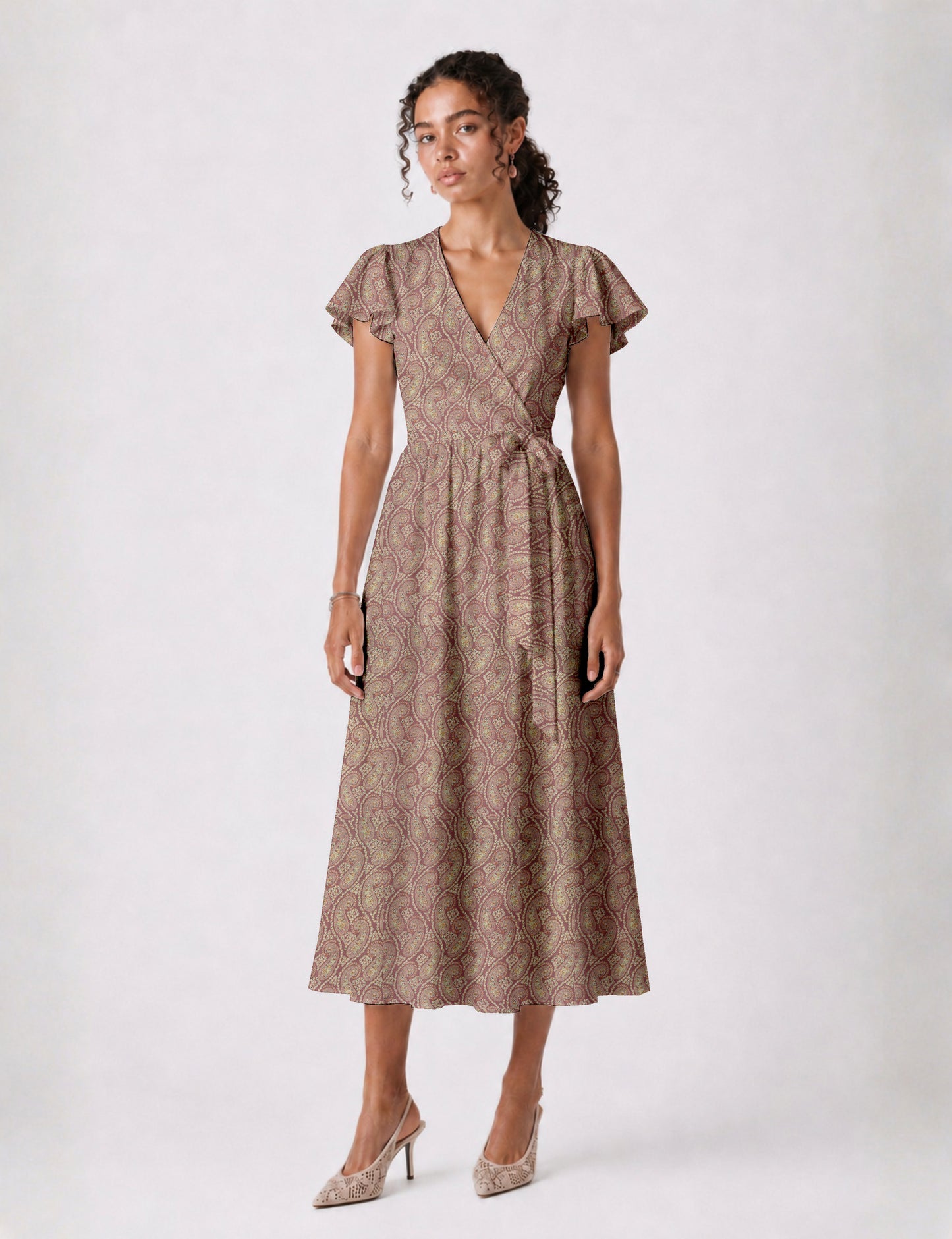 Elegant midi wrap dress with a V-neckline, adjustable waist tie, fitted bodice, and flared skirt for a timeless, flattering silhouette.