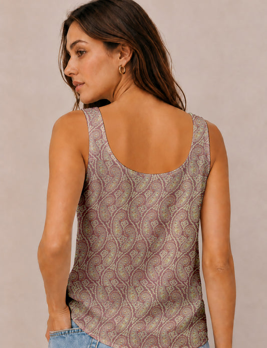 Women's sleeveless blouse with a relaxed straight fit, wide scoop neckline, deep scoop back, and hip-length silhouette.