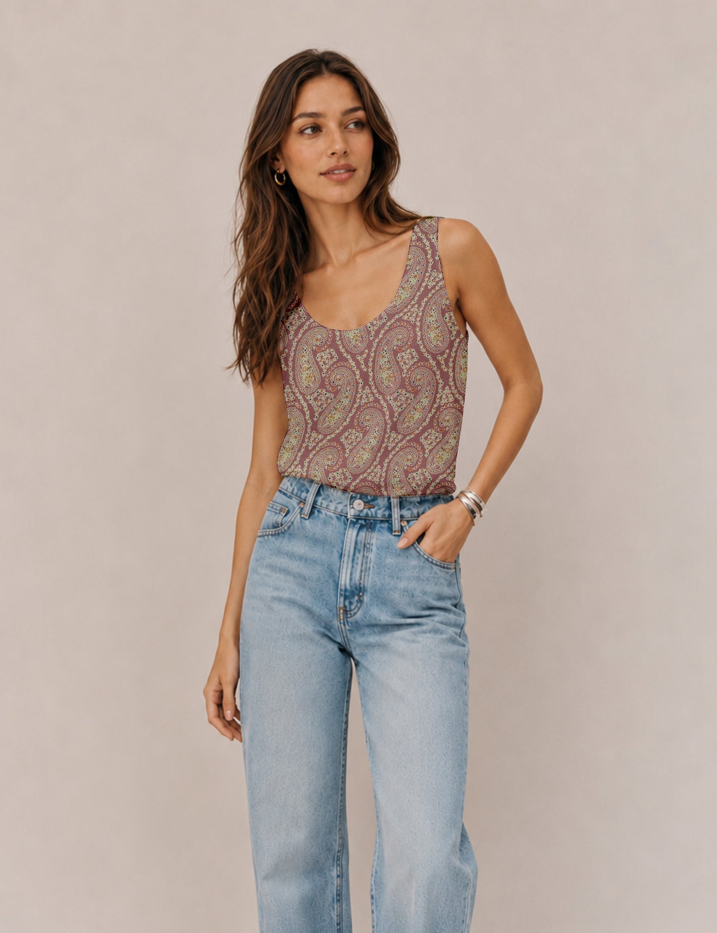 Women's sleeveless blouse with a relaxed straight fit, wide scoop neckline, deep scoop back, and hip-length silhouette.
