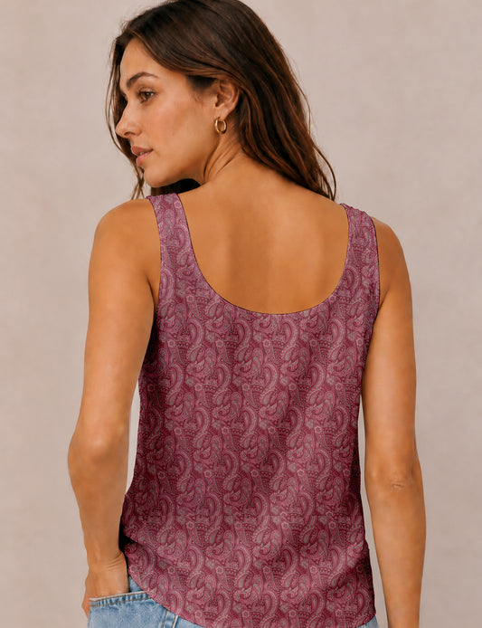 Women's sleeveless blouse with a relaxed straight fit, wide scoop neckline, deep scoop back, and hip-length silhouette.