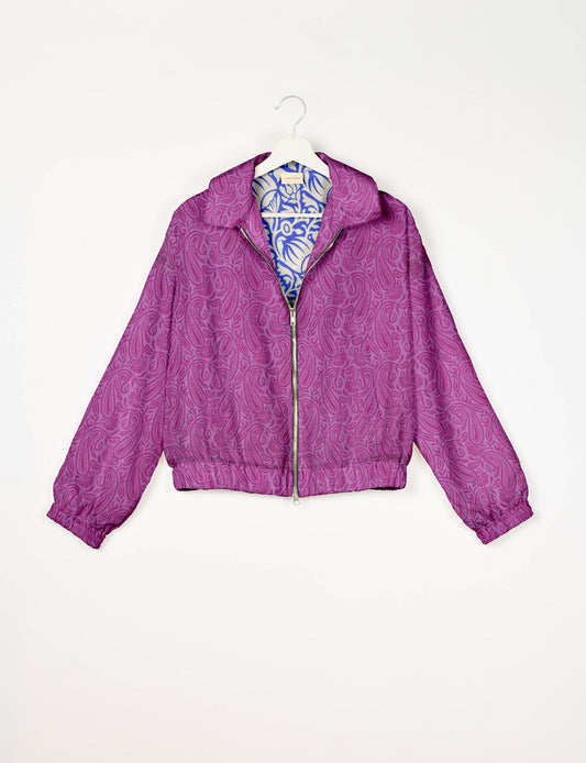 Upcycled Bomber Jacket made from recycled sari materials, featuring a cute cropped shape, elasticated hem and cuffs, and contrast sari print lining. Sustainable apparel promoting eco-friendly fashion and ethical clothing.