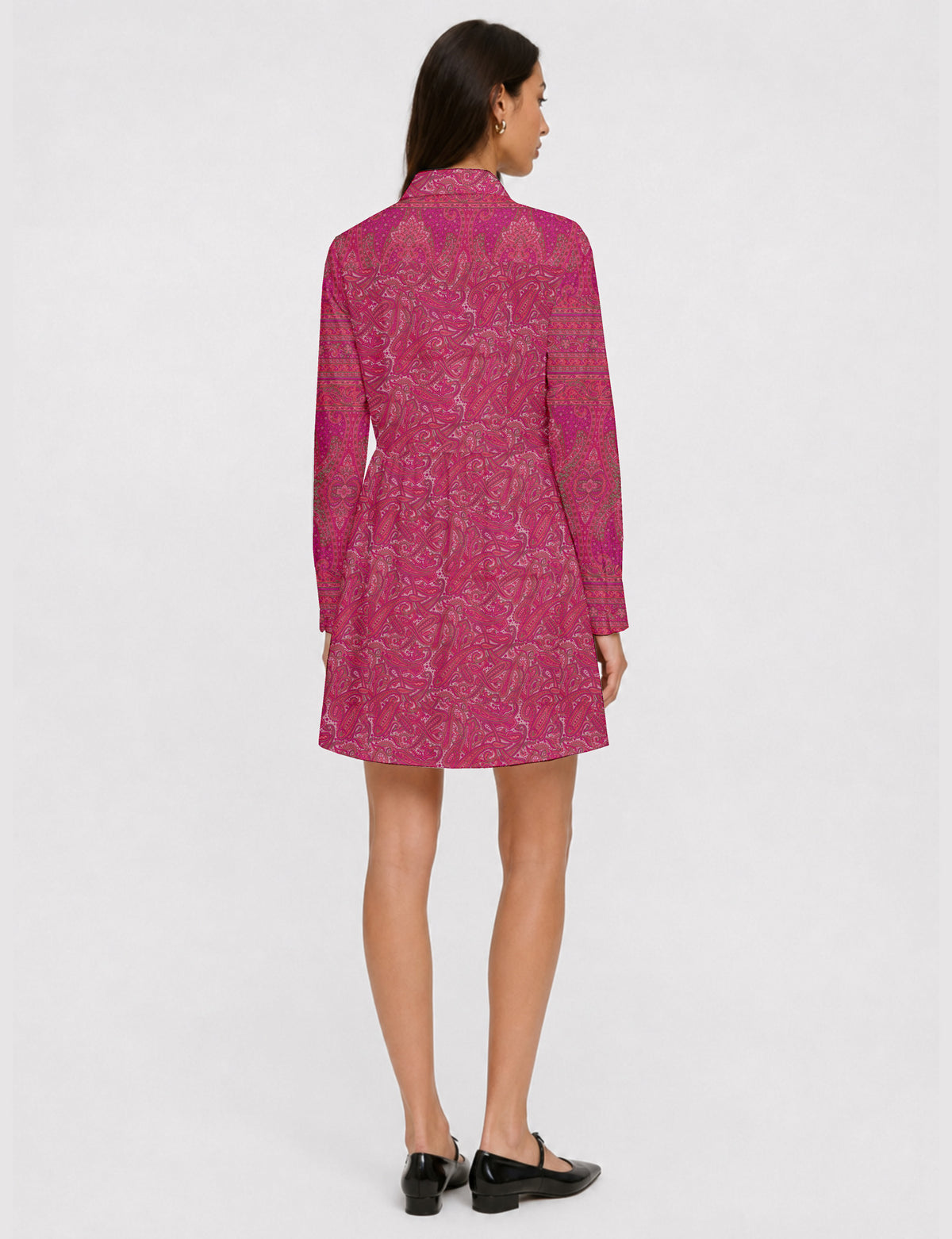 Short shirt dress with a relaxed A-line silhouette, point collar, partial button placket, gathered waist, side pockets, and full-length cuffed sleeves.
