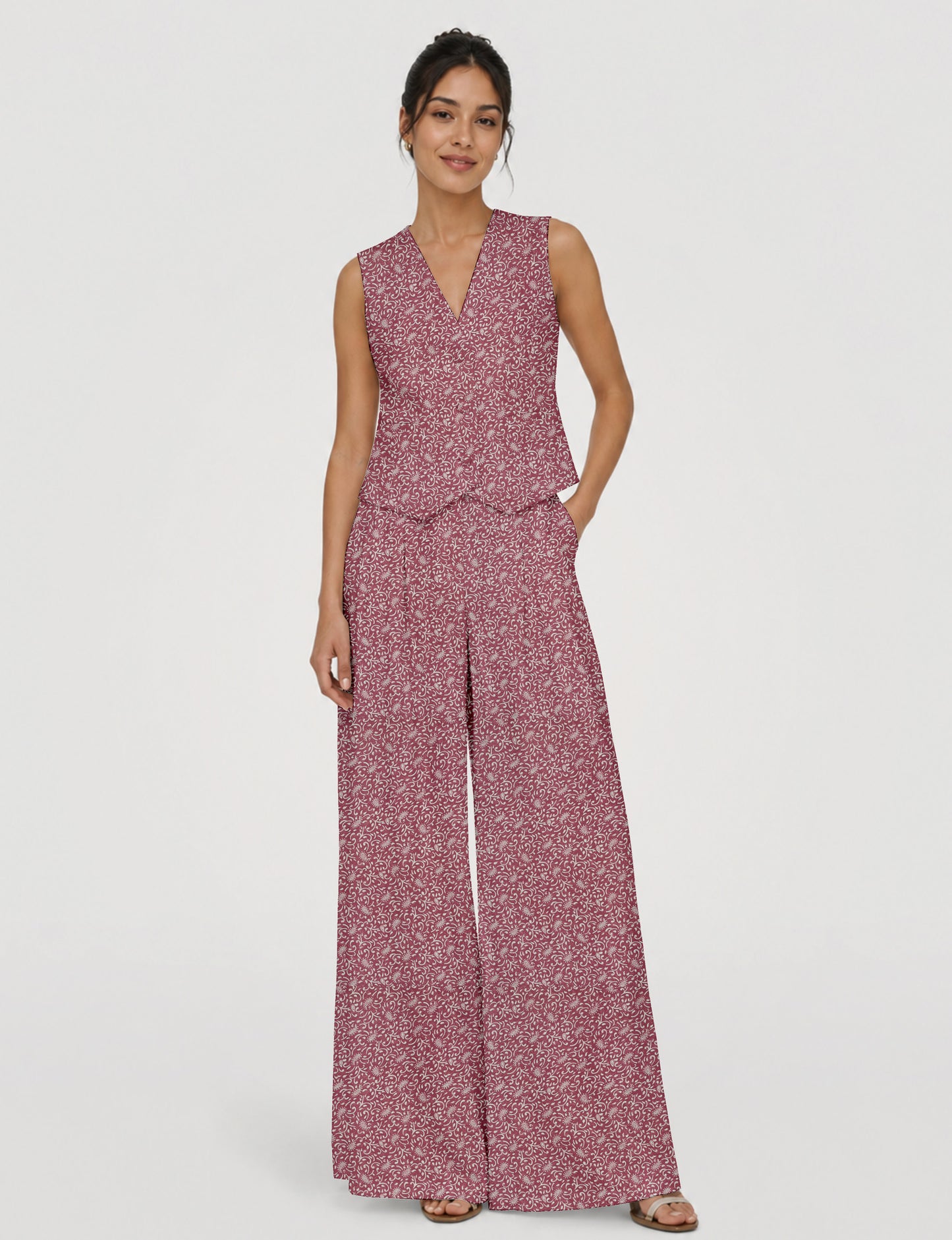 Women's tailored waistcoat set with a sleeveless V-neck button-front waistcoat and high-rise wide leg trousers in a coordinated matching outfit.
