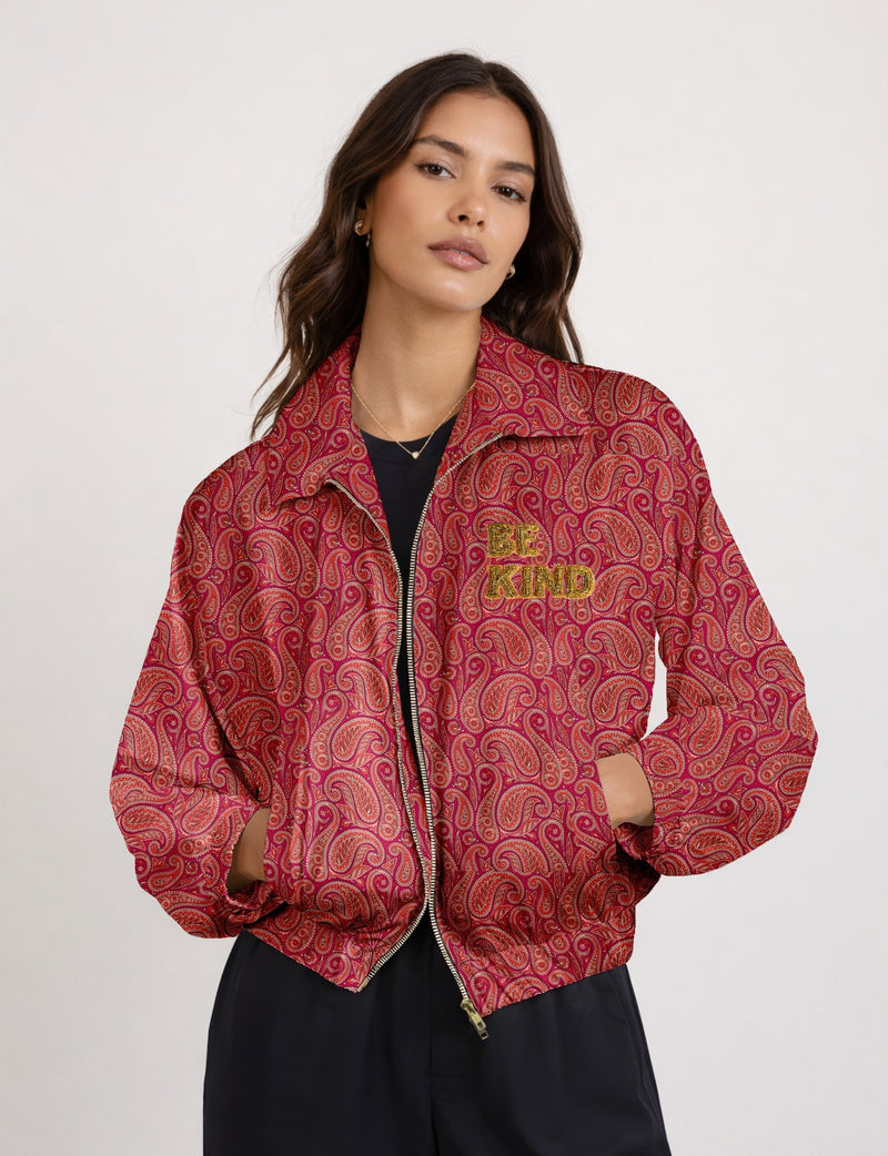 BE KIND Bomber jacket made from upcycled sari fabric with handcrafted Aari embroidery by female artisans.