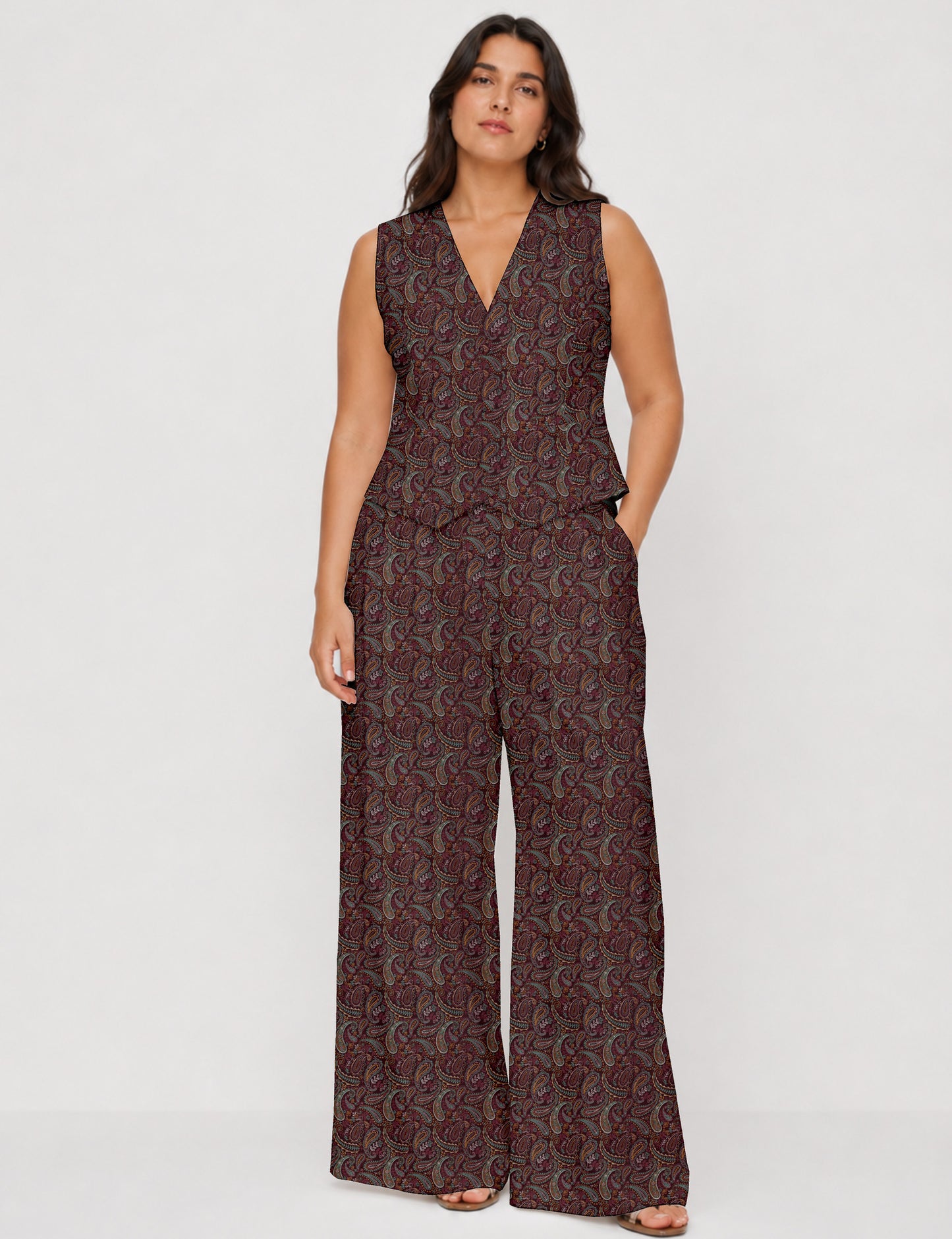 Women's tailored waistcoat set with a sleeveless V-neck button-front waistcoat and high-rise wide leg trousers in a coordinated matching outfit.