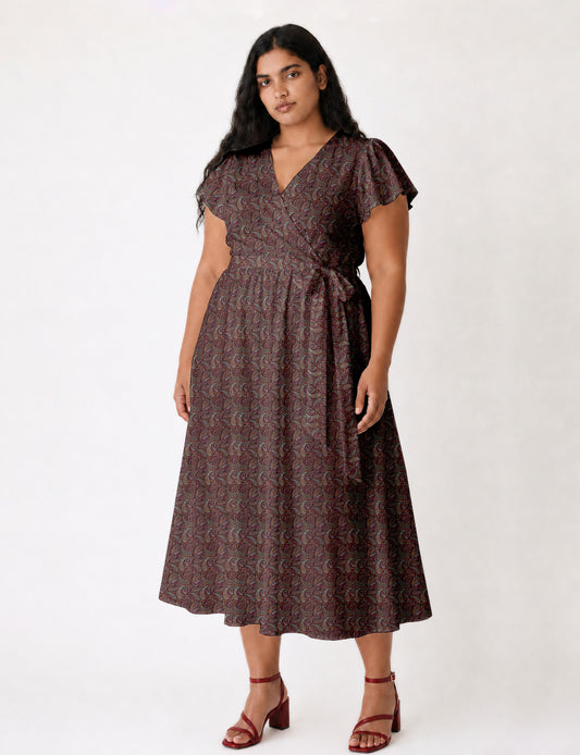 Elegant midi wrap dress with a V-neckline, adjustable waist tie, fitted bodice, and flared skirt for a timeless, flattering silhouette.
