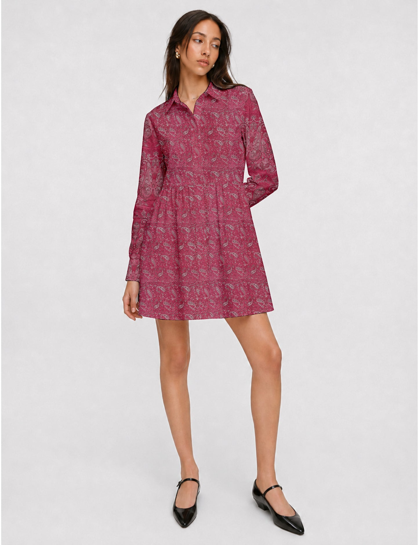 Short shirt dress with a relaxed A-line silhouette, point collar, partial button placket, gathered waist, side pockets, and full-length cuffed sleeves.