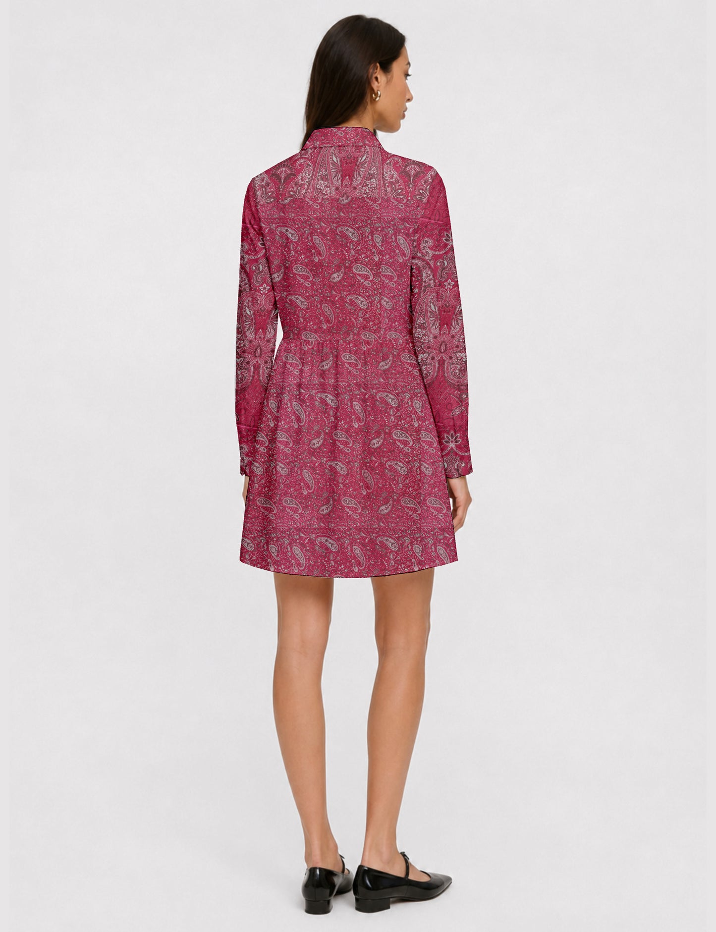 Short shirt dress with a relaxed A-line silhouette, point collar, partial button placket, gathered waist, side pockets, and full-length cuffed sleeves.