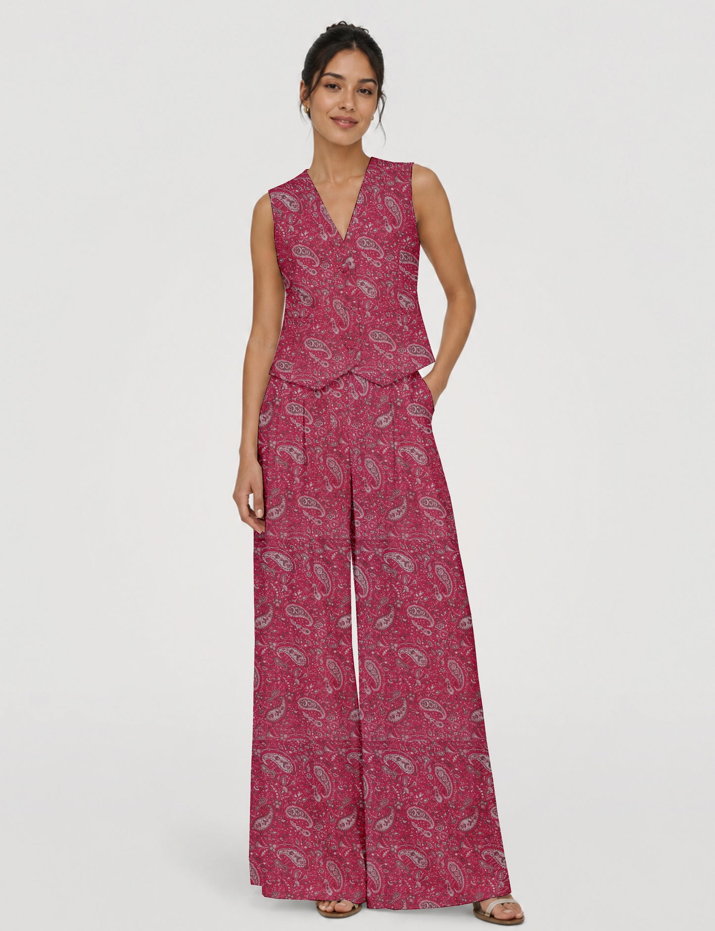 Women's tailored waistcoat set with a sleeveless V-neck button-front waistcoat and high-rise wide leg trousers in a coordinated matching outfit.
