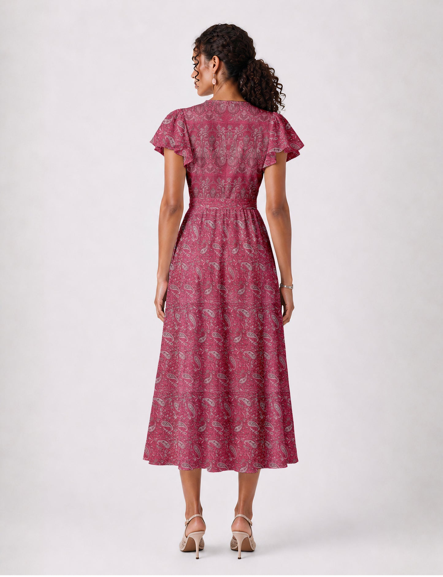 Elegant midi wrap dress with a V-neckline, adjustable waist tie, fitted bodice, and flared skirt for a timeless, flattering silhouette.