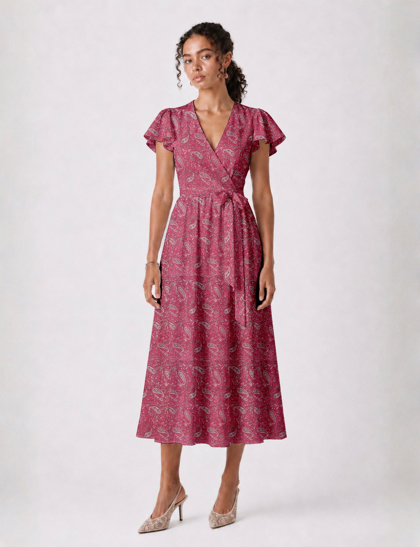 Elegant midi wrap dress with a V-neckline, adjustable waist tie, fitted bodice, and flared skirt for a timeless, flattering silhouette.