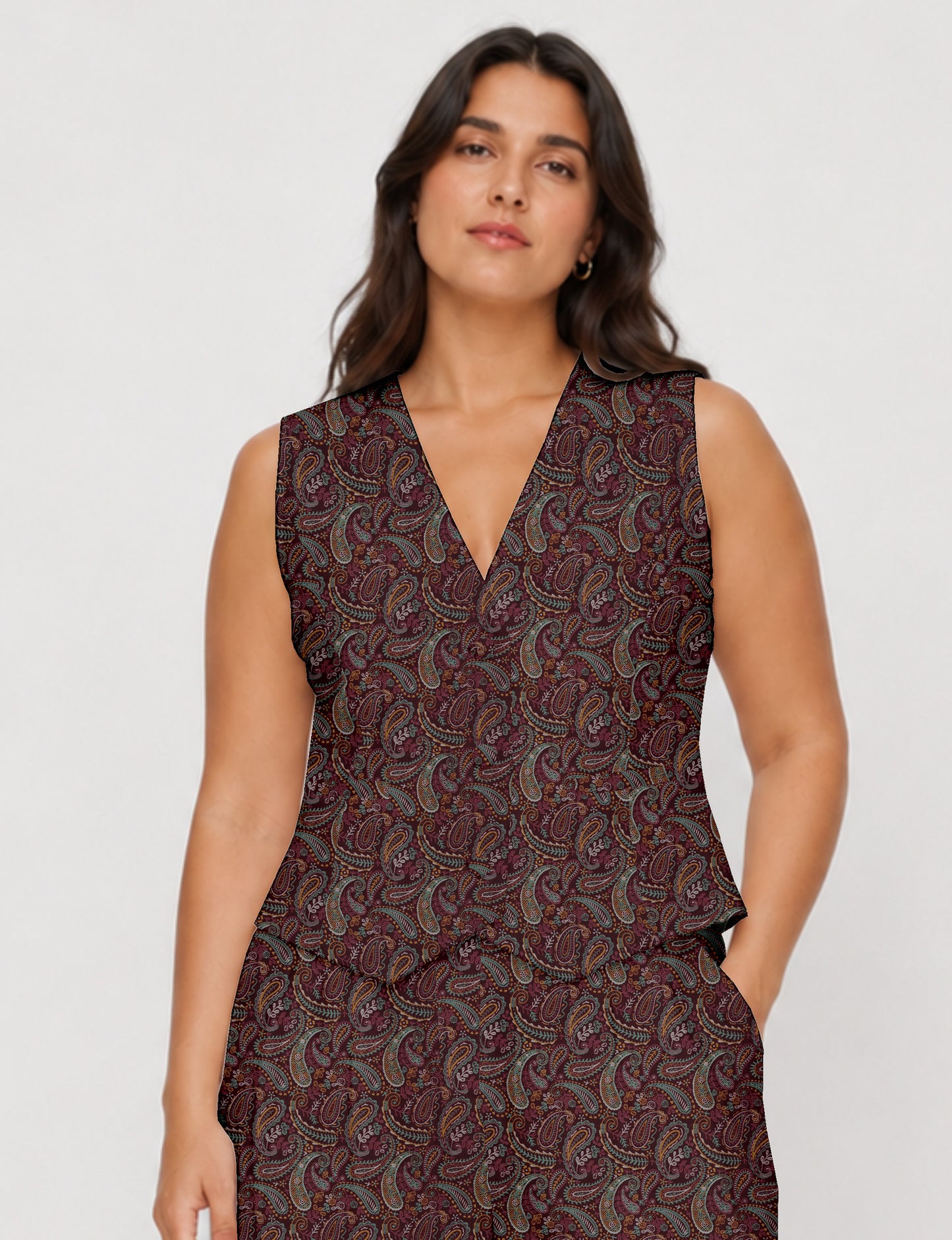 Women's fitted waistcoat with V-neck, single-breasted button closure, tailored silhouette, and pointed hem in sustainable fashion.