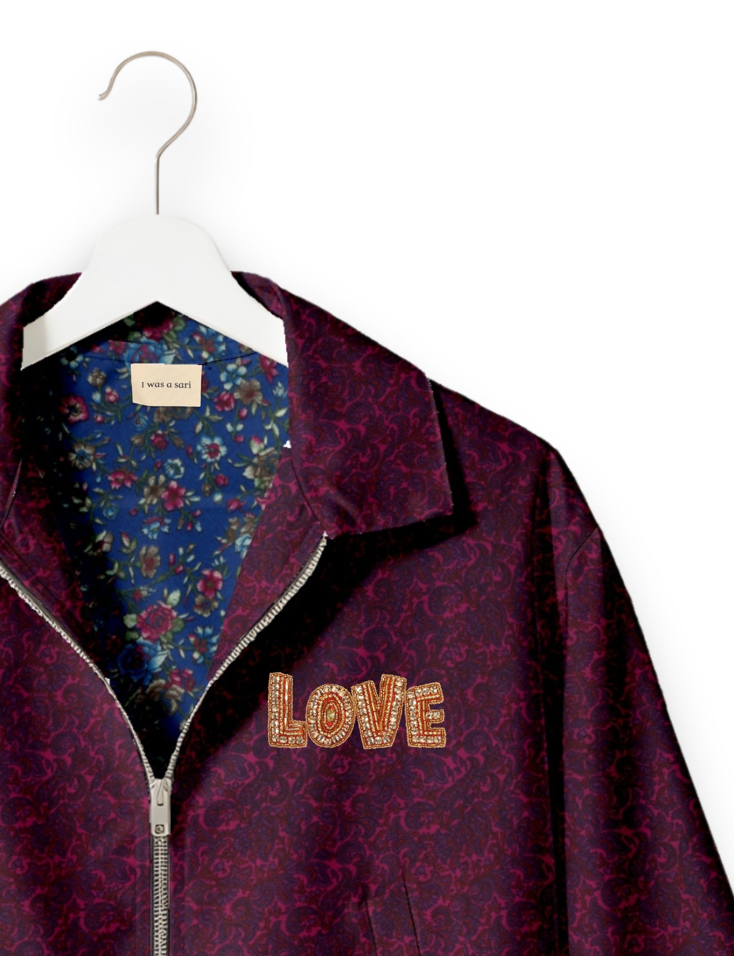 Love Bomber Jacket made from recycled fabric, featuring hand-stitched Aari embroidery. A unique piece of zero-waste clothing, part of the circular fashion movement. Designed with upcycled materials for a stylish yet environmentally friendly clothing choice.