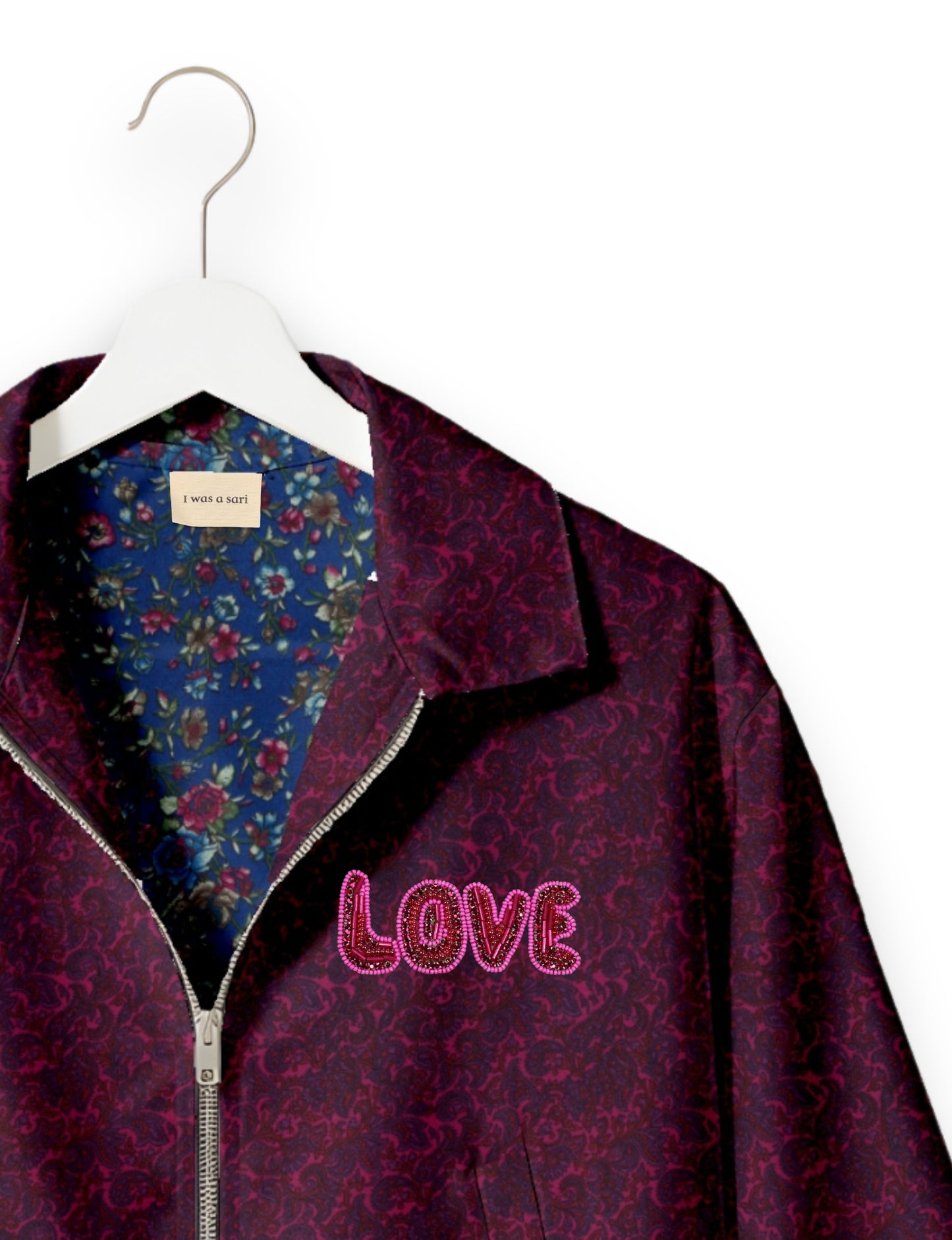 Love Bomber Jacket made from recycled fabric, featuring hand-stitched Aari embroidery. A unique piece of zero-waste clothing, part of the circular fashion movement. Designed with upcycled materials for a stylish yet environmentally friendly clothing choice.