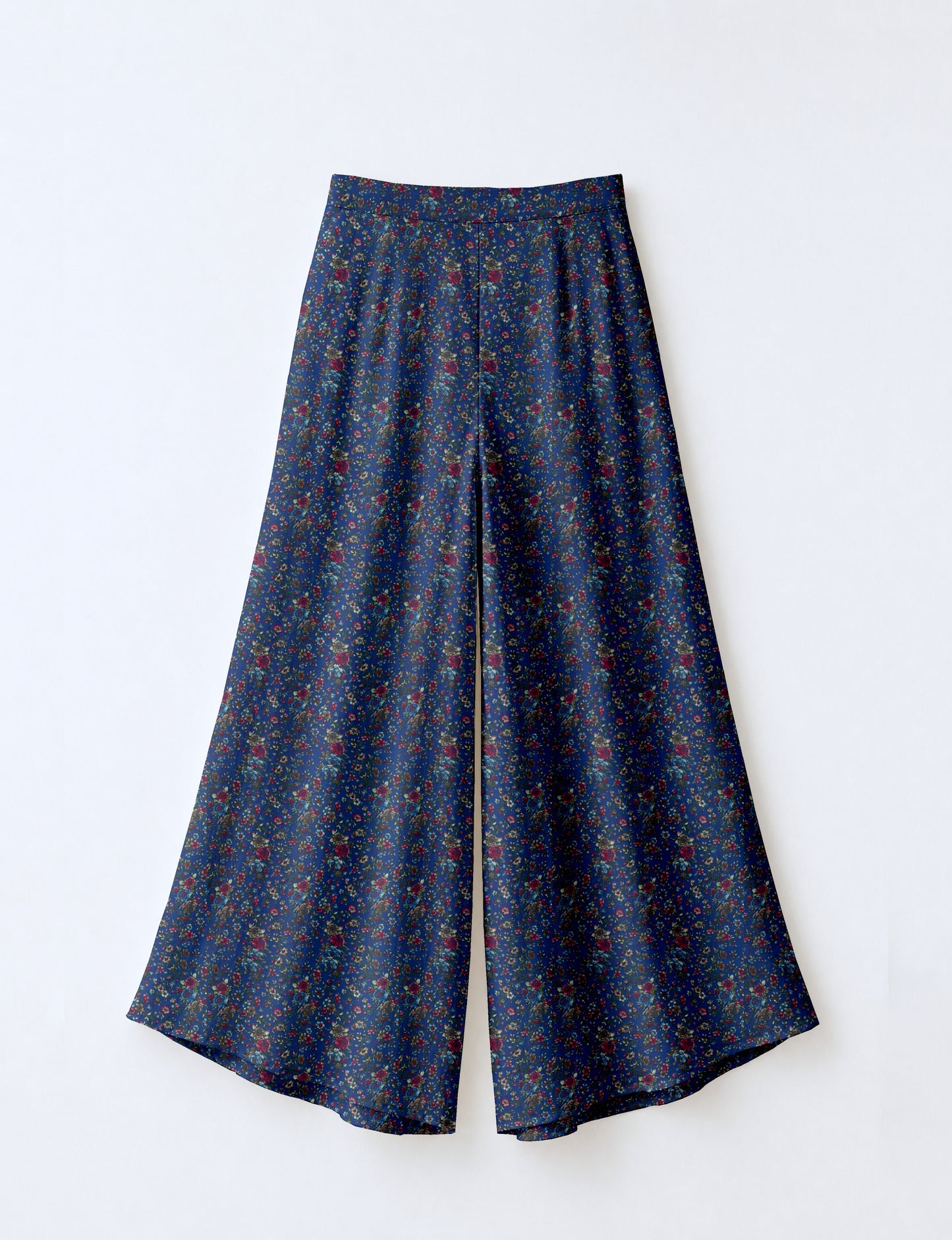 Women's wide leg palazzo trousers with a fitted waistband and relaxed flowing silhouette.