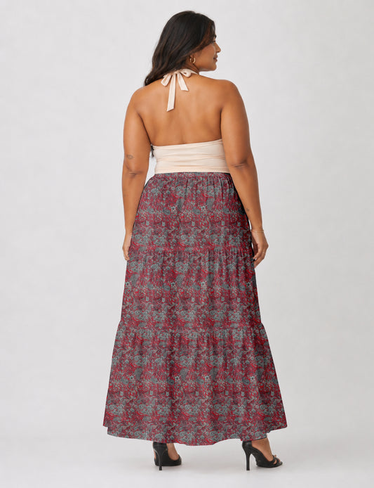Midi tiered skirt with fitted waistband, soft knife pleats, flared silhouette, side seam pockets, and ankle-length hem