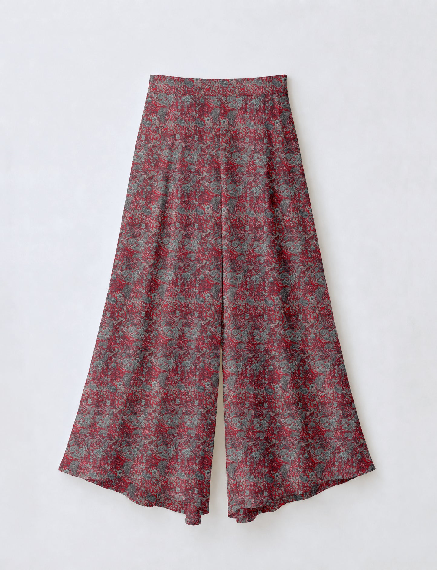 Women's wide leg palazzo trousers with a fitted waistband and relaxed flowing silhouette.