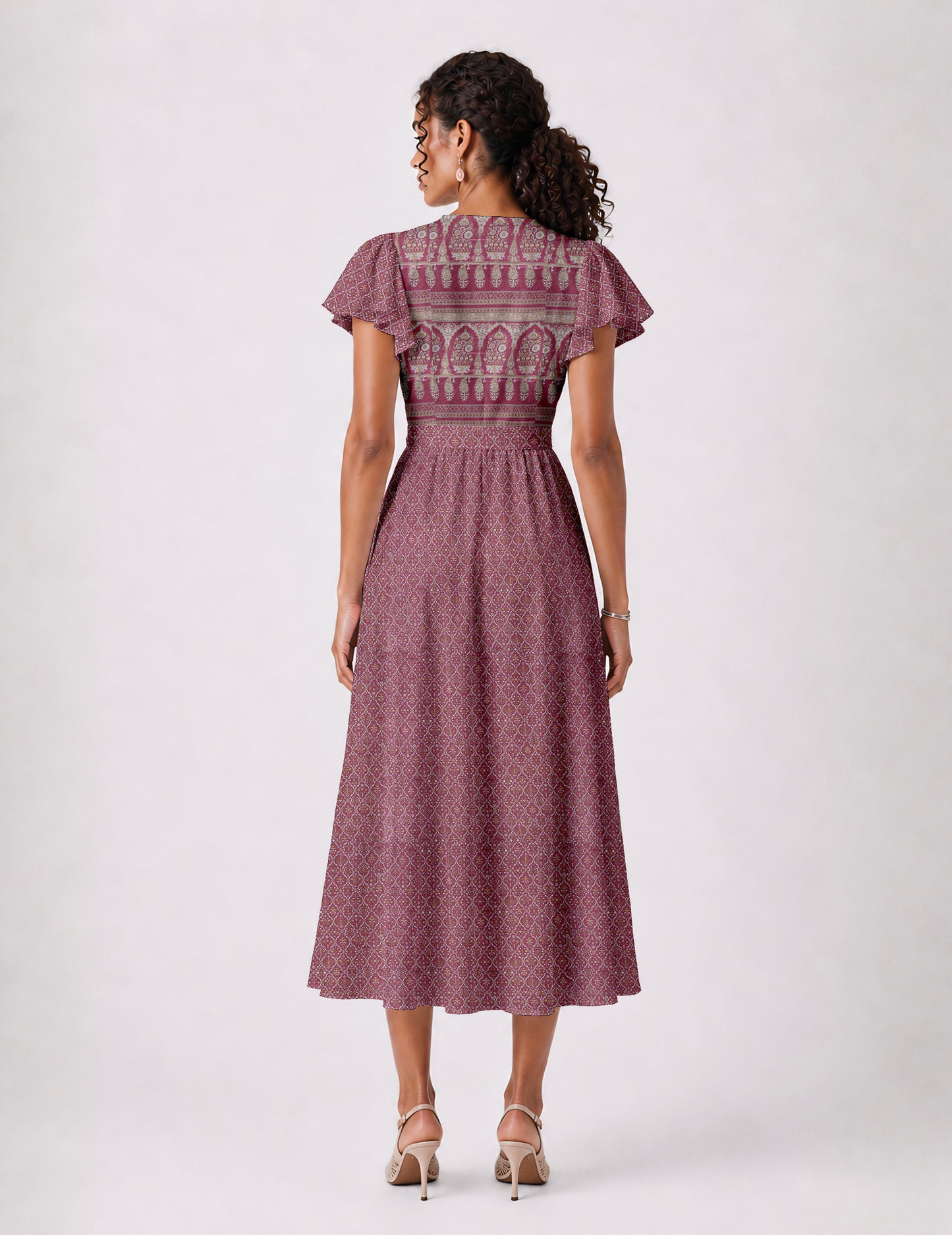 Elegant midi wrap dress with a V-neckline, adjustable waist tie, fitted bodice, and flared skirt for a timeless, flattering silhouette.