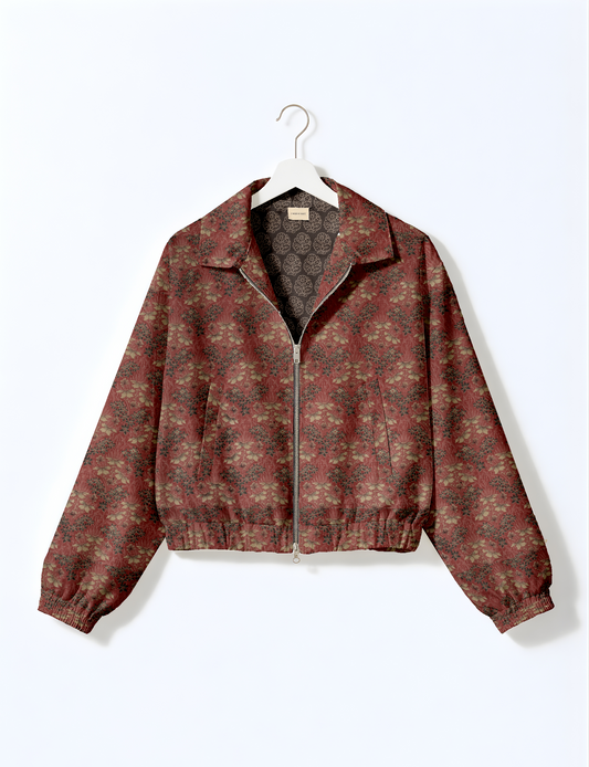 Upcycled Bomber Jacket made from recycled sari materials, featuring a cute cropped shape, elasticated hem and cuffs, and contrast sari print lining. Sustainable apparel promoting eco-friendly fashion and ethical clothing.