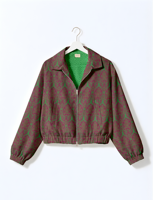 Upcycled Bomber Jacket made from recycled sari materials, featuring a cute cropped shape, elasticated hem and cuffs, and contrast sari print lining. Sustainable apparel promoting eco-friendly fashion and ethical clothing.