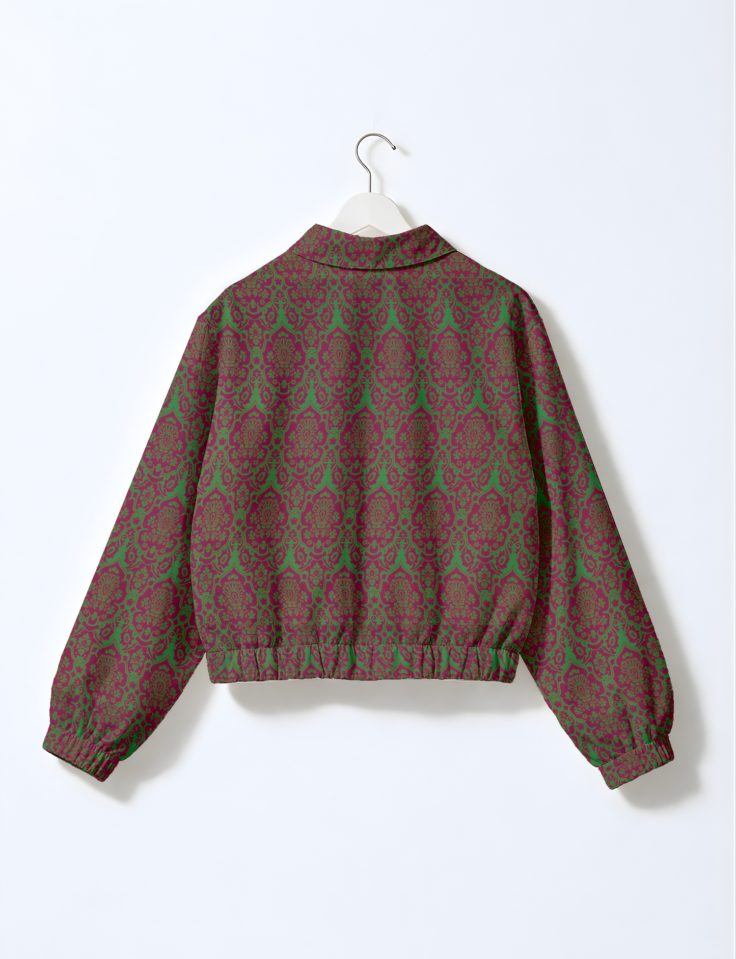 Upcycled Bomber Jacket made from recycled sari materials, featuring a cute cropped shape, elasticated hem and cuffs, and contrast sari print lining. Sustainable apparel promoting eco-friendly fashion and ethical clothing.