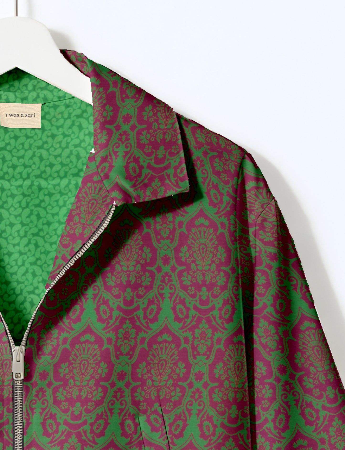 Upcycled Bomber Jacket made from recycled sari materials, featuring a cute cropped shape, elasticated hem and cuffs, and contrast sari print lining. Sustainable apparel promoting eco-friendly fashion and ethical clothing.