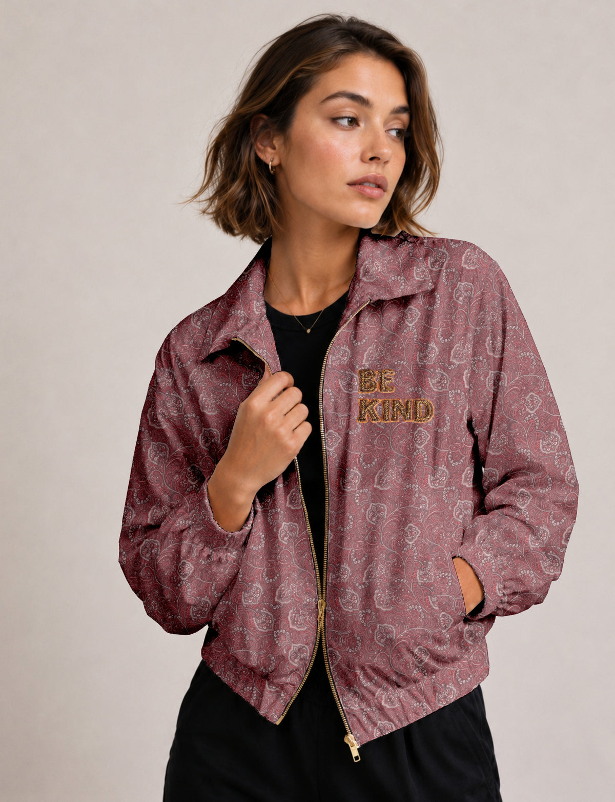 BE KIND Bomber jacket made from upcycled sari fabric with handcrafted Aari embroidery by female artisans.