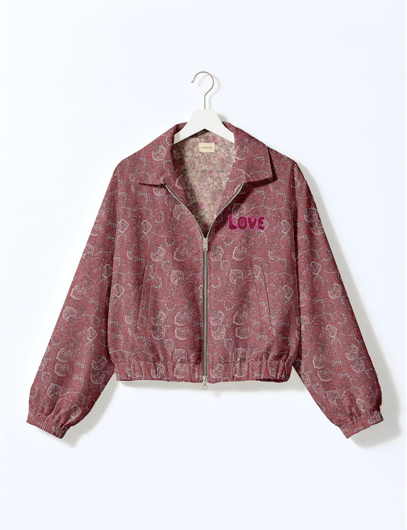 Love Bomber Jacket made from recycled fabric, featuring hand-stitched Aari embroidery. A unique piece of zero-waste clothing, part of the circular fashion movement. Designed with upcycled materials for a stylish yet environmentally friendly clothing choice.