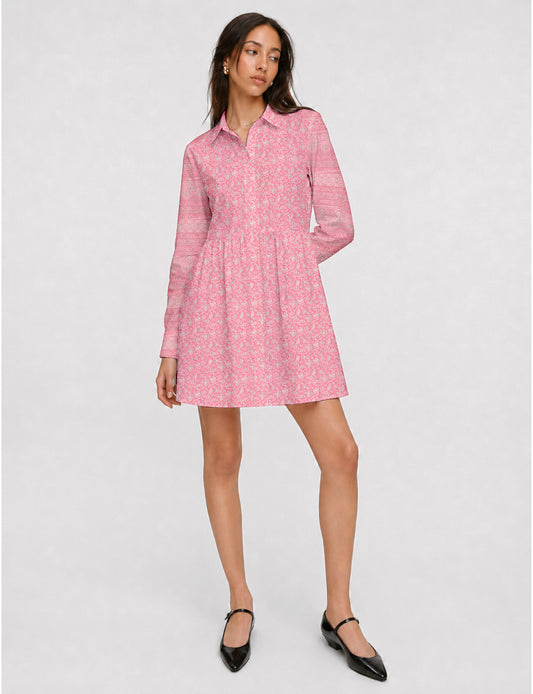 Short shirt dress with a relaxed A-line silhouette, point collar, partial button placket, gathered waist, side pockets, and full-length cuffed sleeves.