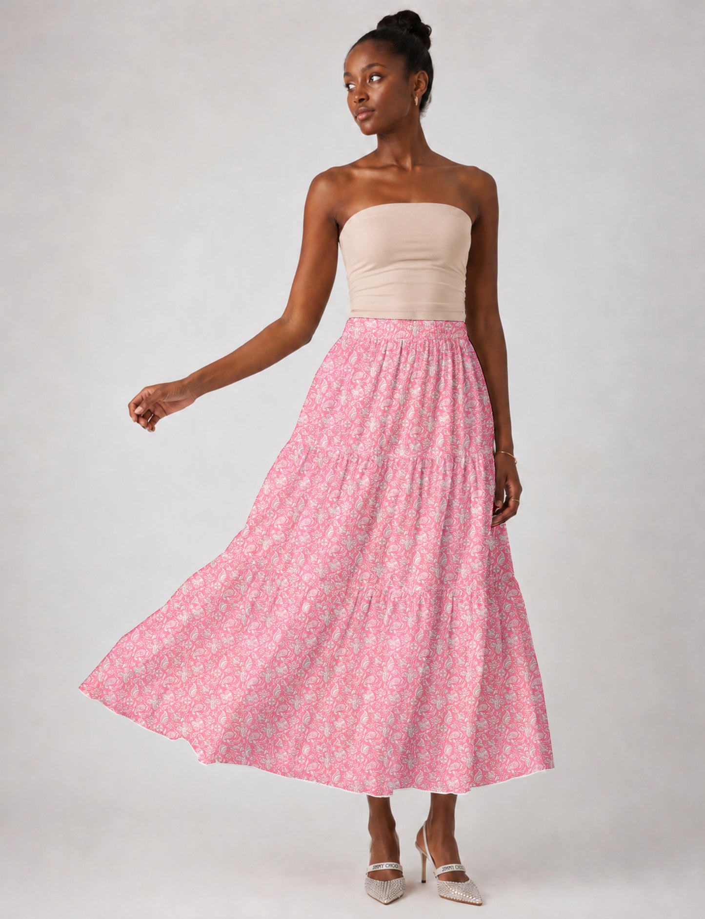 Yellow midi tiered skirt with small dark geometric micro pattern, flat lay front view