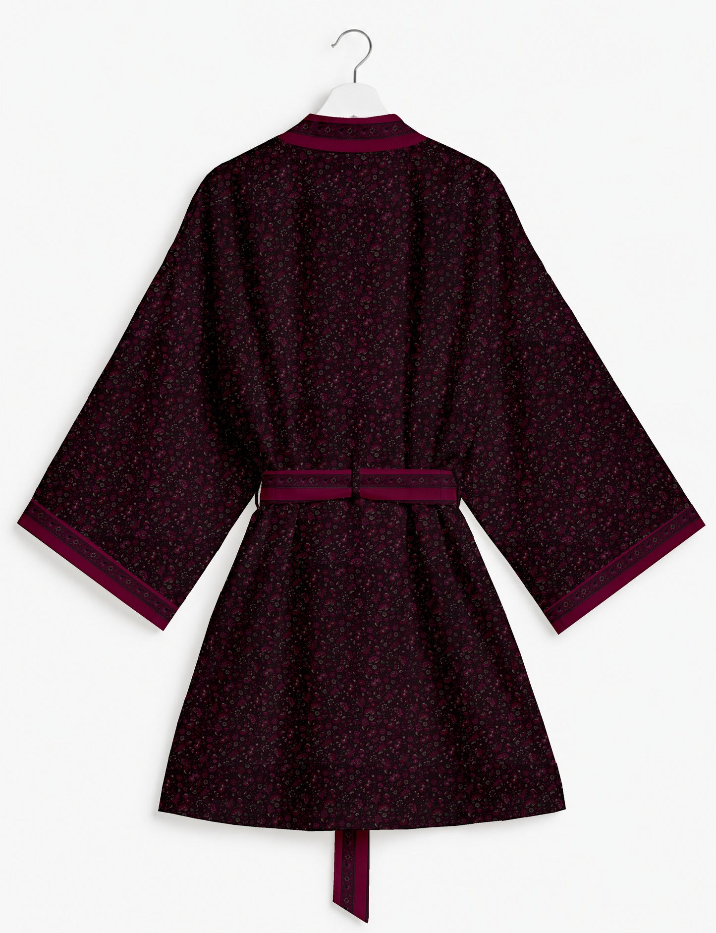 Short kimono robe with wrap front, V-neckline, wide sleeves, waist tie, and concealed skort detail.
