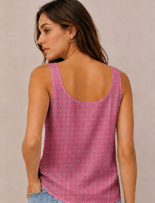 Women's sleeveless blouse with a relaxed straight fit, wide scoop neckline, deep scoop back, and hip-length silhouette.