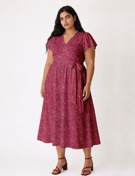 Elegant midi wrap dress with a V-neckline, adjustable waist tie, fitted bodice, and flared skirt for a timeless, flattering silhouette.