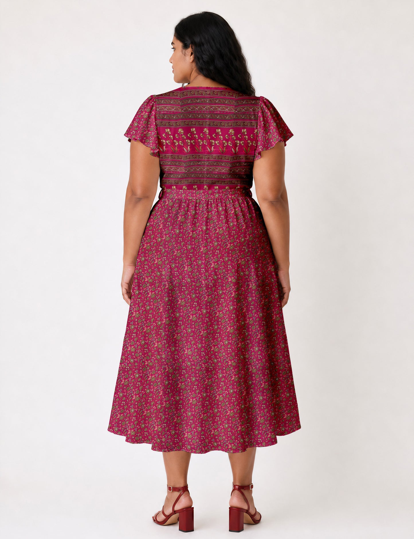 Elegant midi wrap dress with a V-neckline, adjustable waist tie, fitted bodice, and flared skirt for a timeless, flattering silhouette.