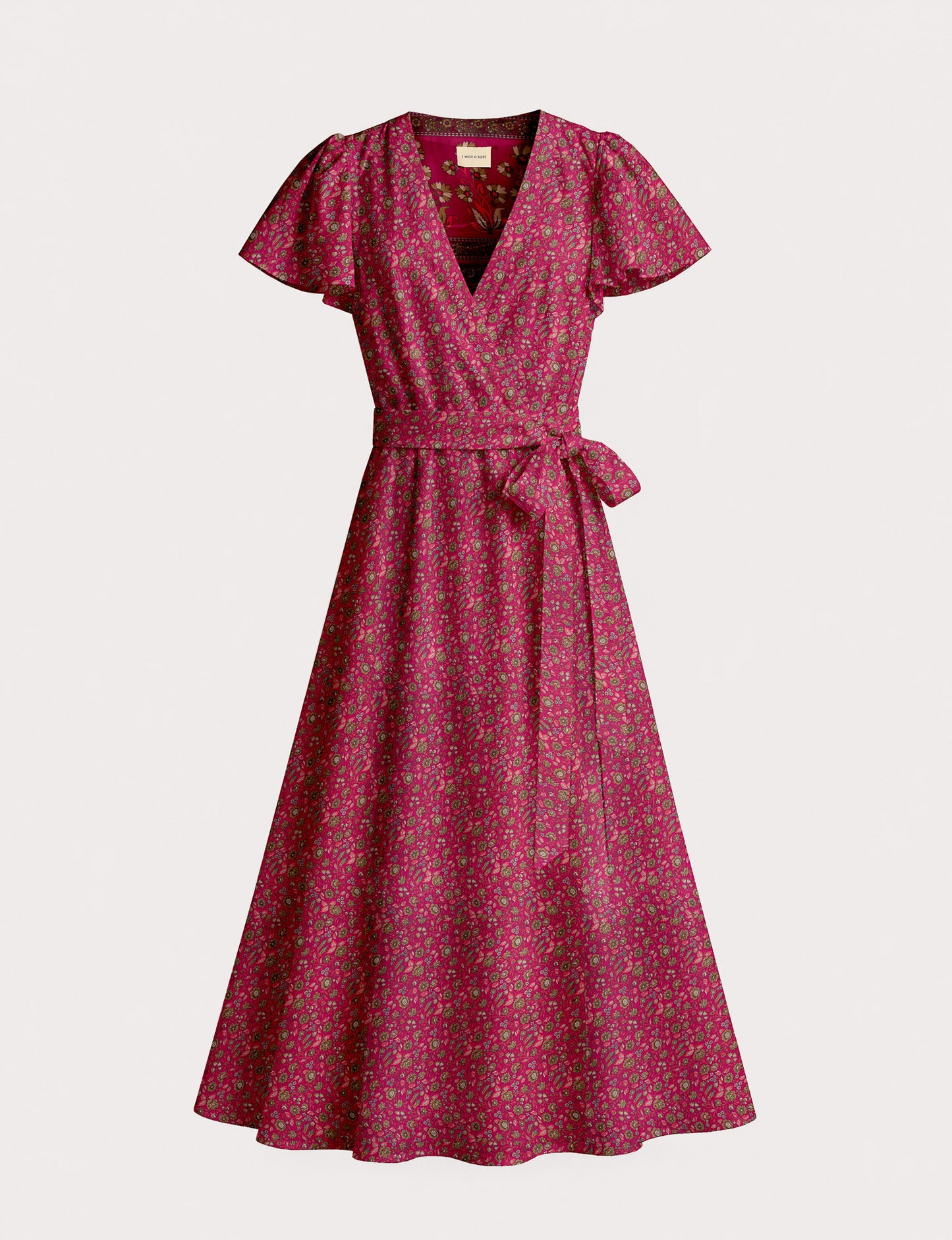Elegant midi wrap dress with a V-neckline, adjustable waist tie, fitted bodice, and flared skirt for a timeless, flattering silhouette.