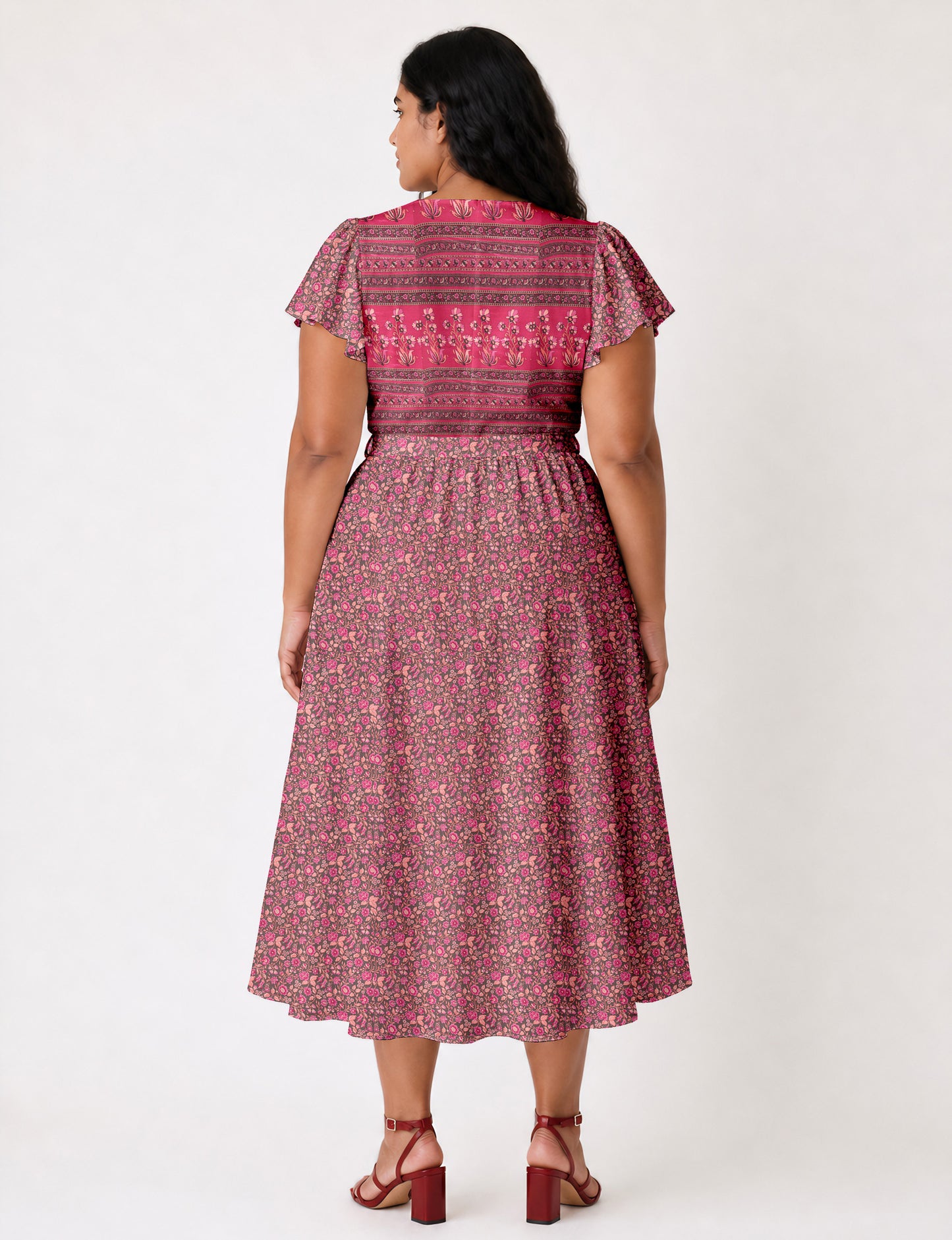 Elegant midi wrap dress with a V-neckline, adjustable waist tie, fitted bodice, and flared skirt for a timeless, flattering silhouette.