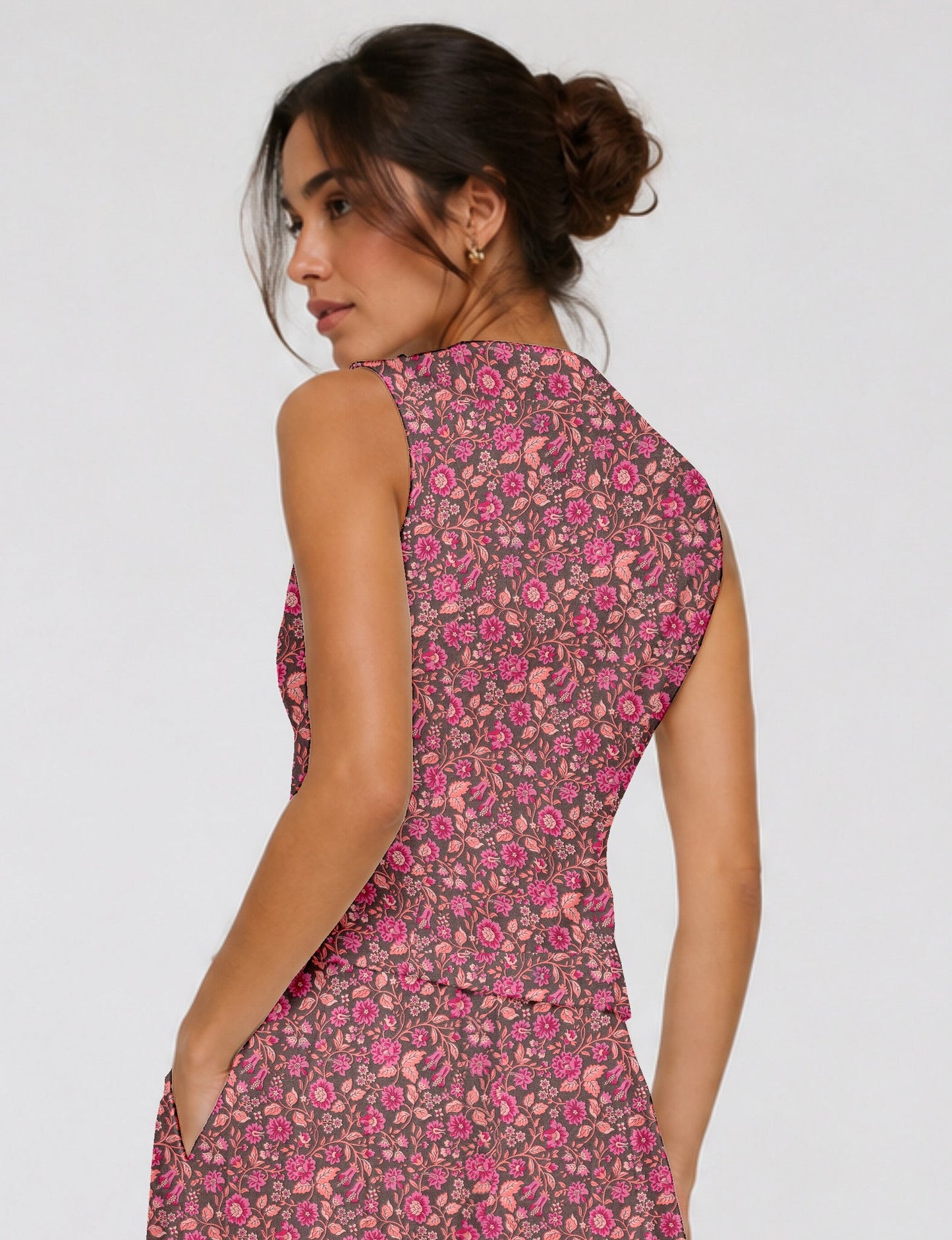 Women's fitted waistcoat with V-neck, single-breasted button closure, tailored silhouette, and pointed hem in sustainable fashion.