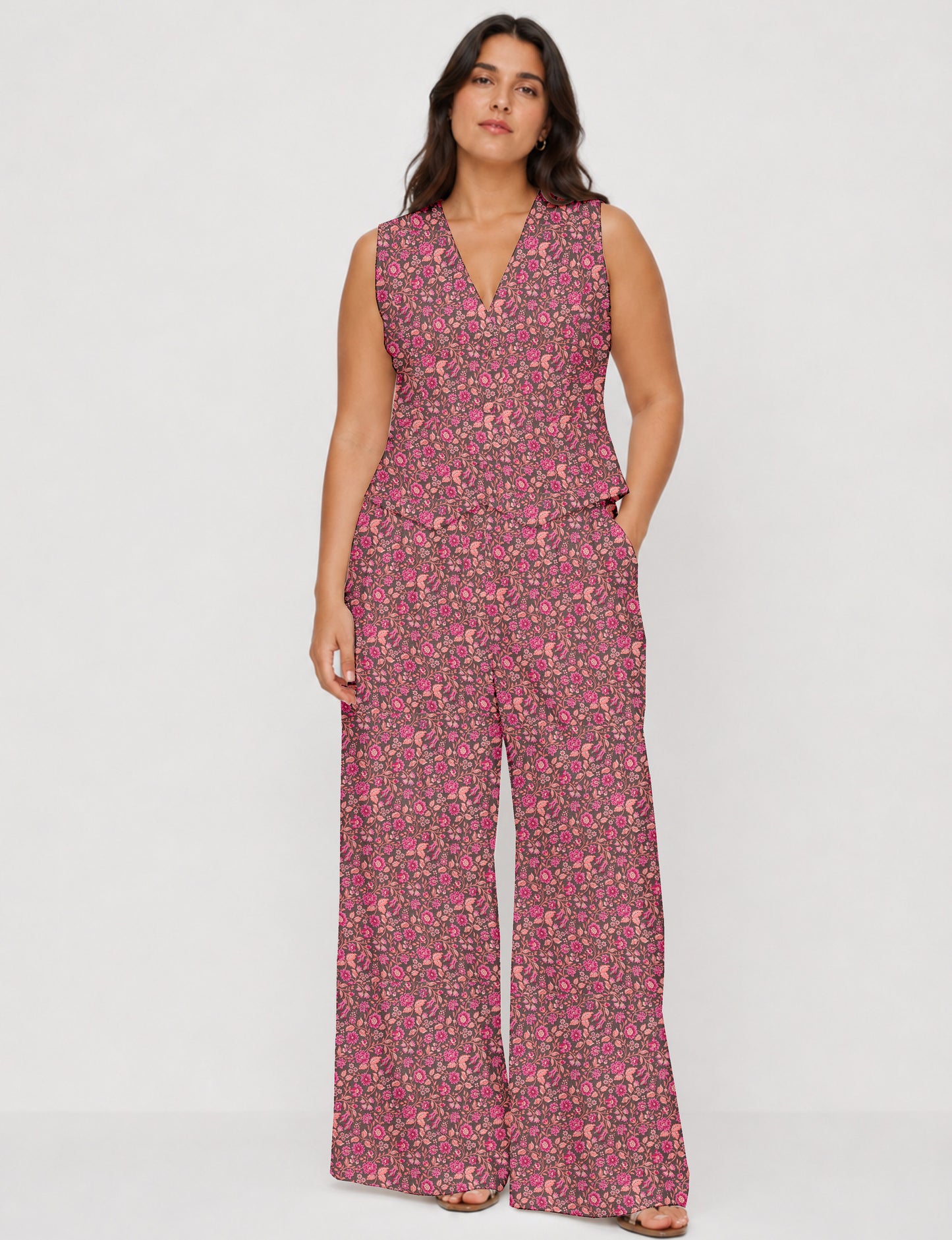 Women's tailored waistcoat set with a sleeveless V-neck button-front waistcoat and high-rise wide leg trousers in a coordinated matching outfit.