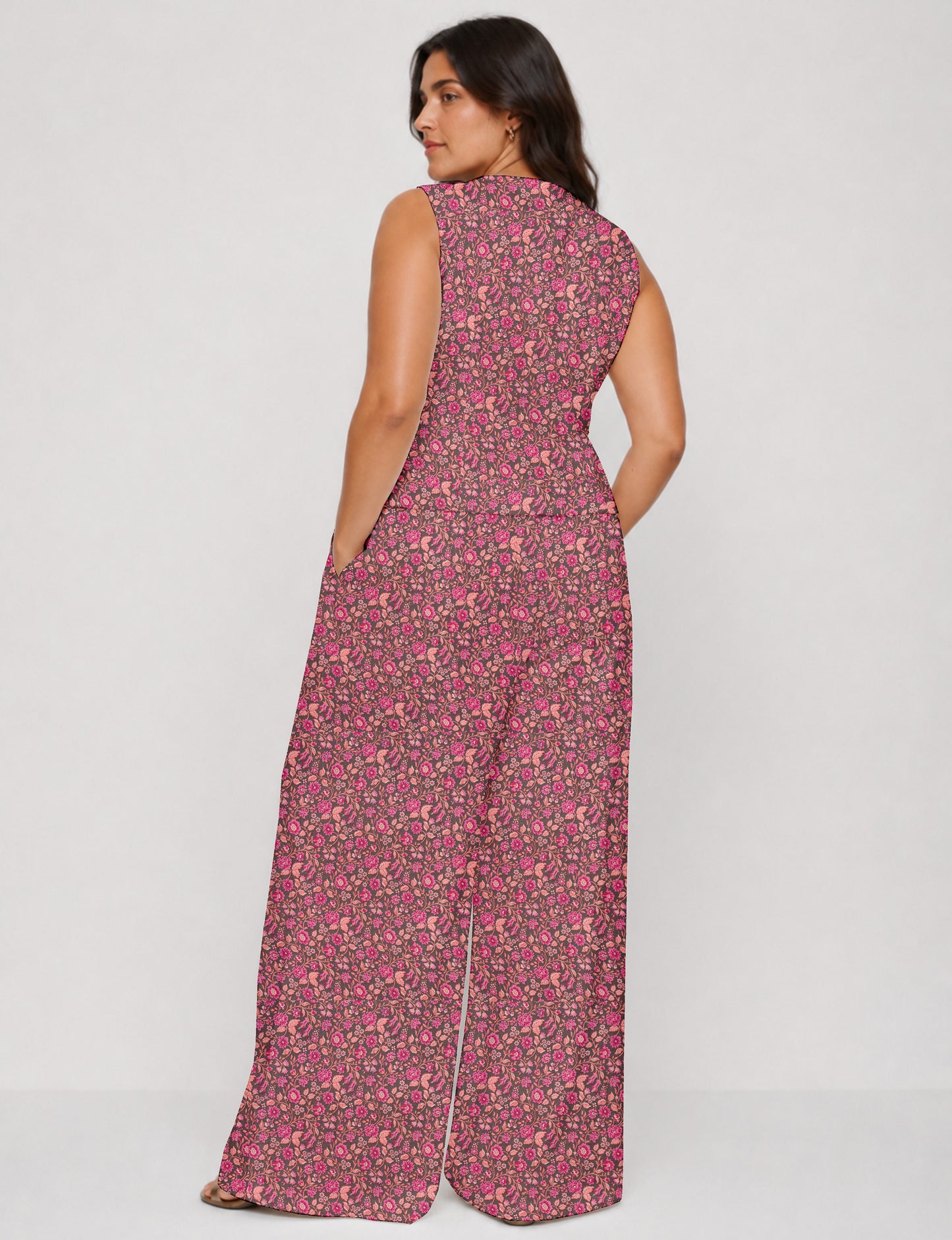 Women's tailored waistcoat set with a sleeveless V-neck button-front waistcoat and high-rise wide leg trousers in a coordinated matching outfit.