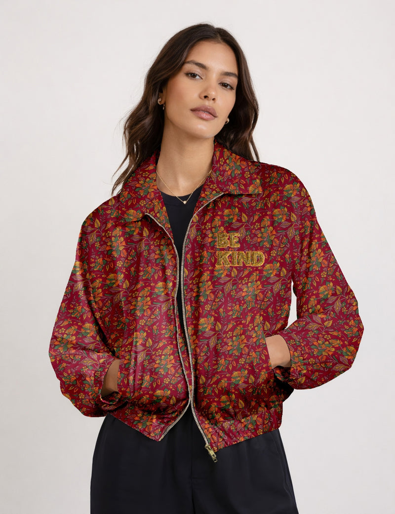 BE KIND Bomber jacket made from upcycled sari fabric with handcrafted Aari embroidery by female artisans.