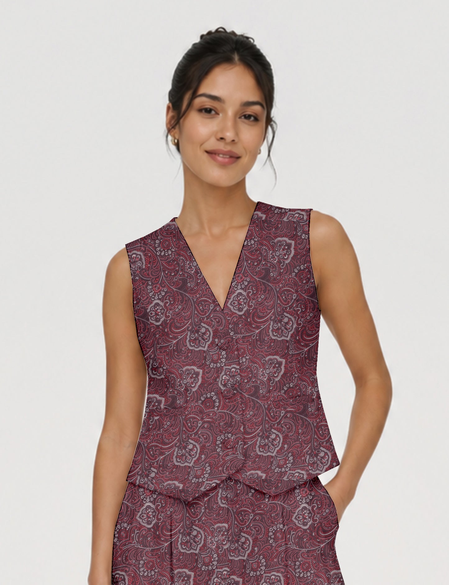 Women's fitted waistcoat with V-neck, single-breasted button closure, tailored silhouette, and pointed hem in sustainable fashion.