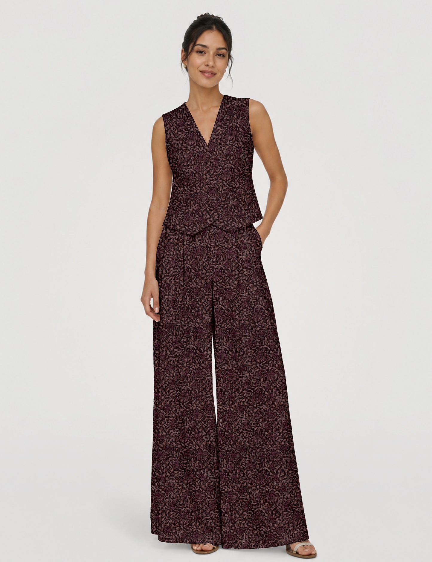 Women's tailored waistcoat set with a sleeveless V-neck button-front waistcoat and high-rise wide leg trousers in a coordinated matching outfit.