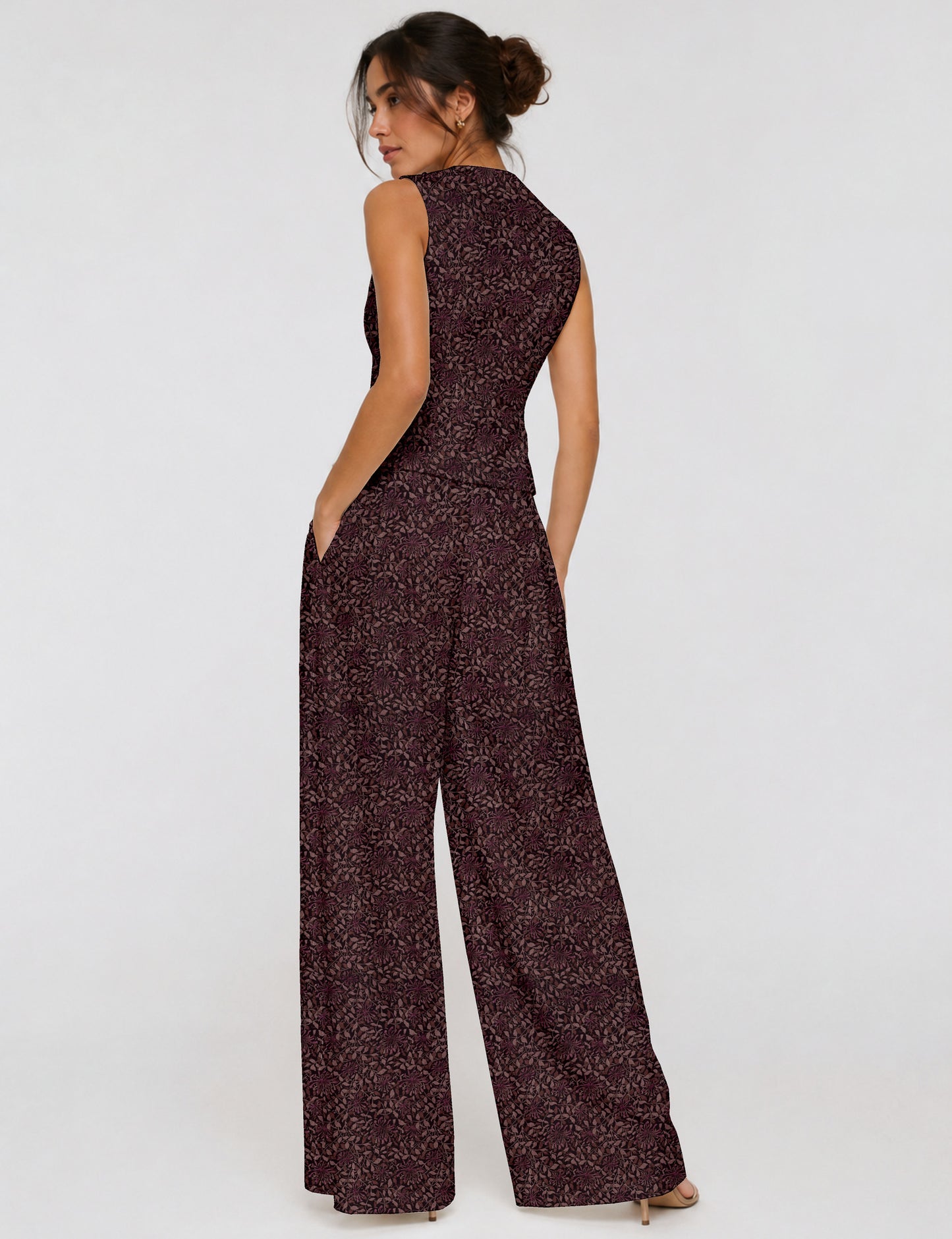 Women's tailored waistcoat set with a sleeveless V-neck button-front waistcoat and high-rise wide leg trousers in a coordinated matching outfit.