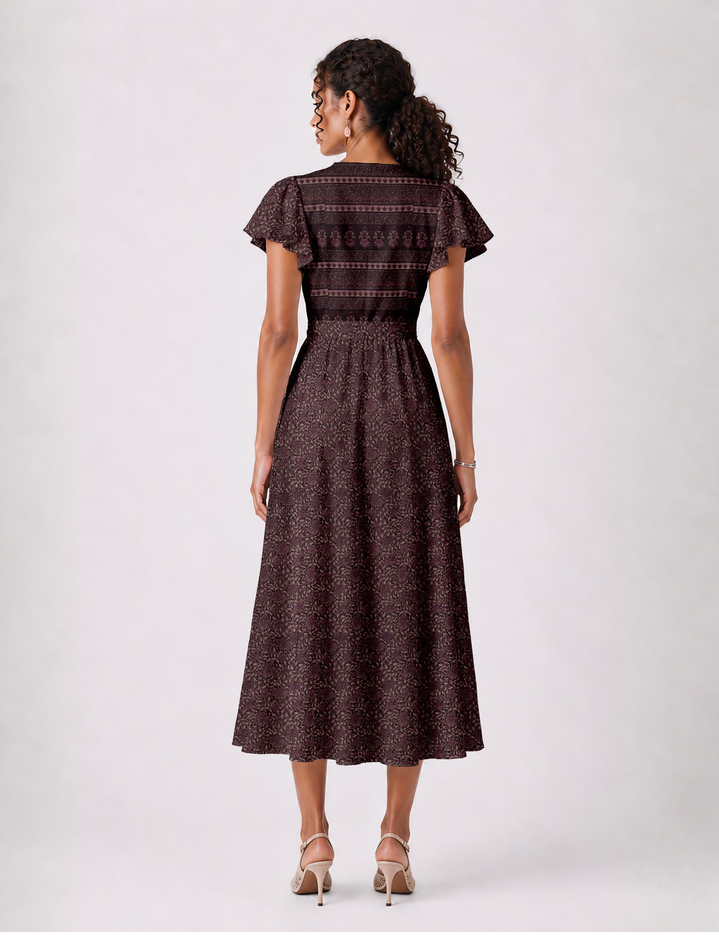 Elegant midi wrap dress with a V-neckline, adjustable waist tie, fitted bodice, and flared skirt for a timeless, flattering silhouette.